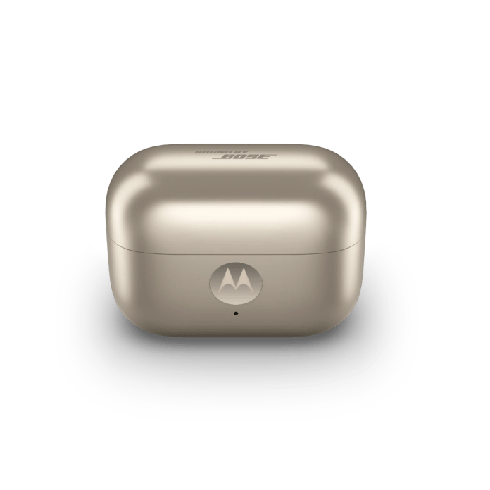 Close-up view of the Motorola moto buds loop charging case in a sleek, light color, featuring the 'Sound by Bose' logo.