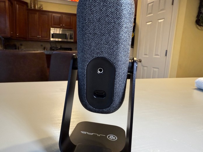 Rear view of the JLab Go Talk USB microphone on its stand, highlighting the USB-C port and design features.