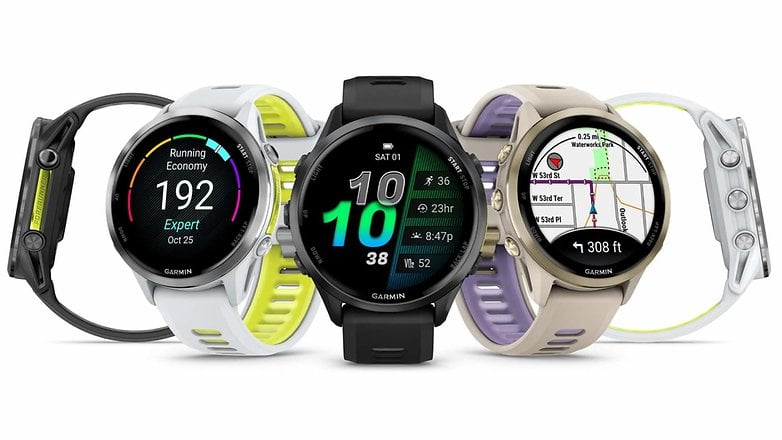 Three Garmin Forerunner 970 smartwatches displaying various fitness metrics and navigation features.