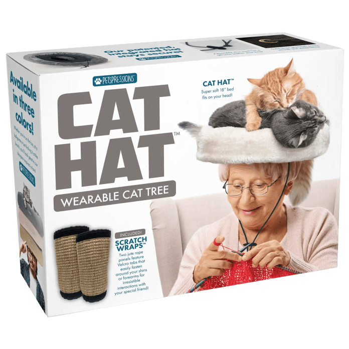 Packaging for the Cat Hat, a wearable cat tree featuring an elderly woman knitting with two cats resting on her head.