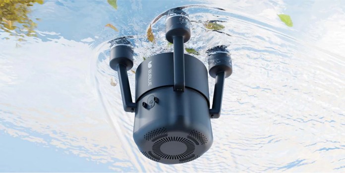 The BuVortex V5 surface skimmer floating on water, equipped with dual motors and a sleek design, removing leaves and debris.
