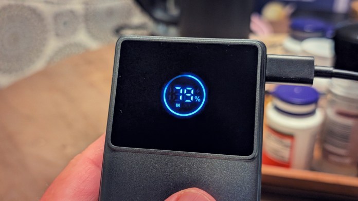 Close-up of Joyroom JR-PR1 Retractable Power Bank displaying a digital screen showing 78% charge.