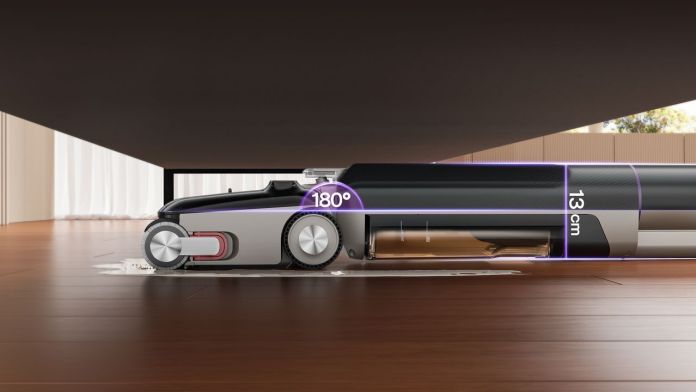 Eureka FloorShine 880 vacuum laying flat at 180° under furniture, showcasing its low profile of 13 cm on wooden floor.