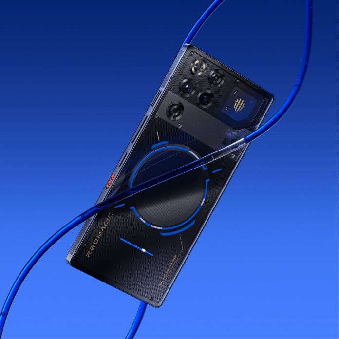 Close-up of the REDMAGIC 11 Pro smartphone showcasing its sleek design and unique cooling features against a blue background.