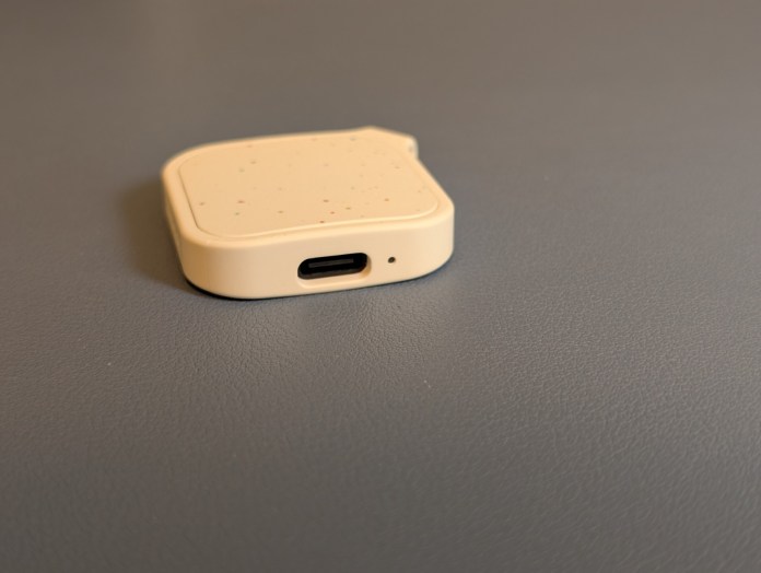 Close-up view of the LOC8 Finder Fob 2 Universal showing the USB-C charging port and textured surface.