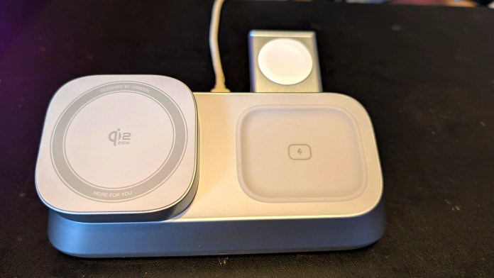 A UGREEN 3-in-1 Magnetic Wireless Charger designed for multiple devices, showcasing a sleek, silver finish with compartments for charging an iPhone, AirPods, and Apple Watch.