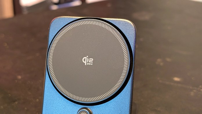 Close-up view of the ESR CryoBoost 3-in-1 Magnetic Charging Station featuring a circular charging pad with Qi2 logo.