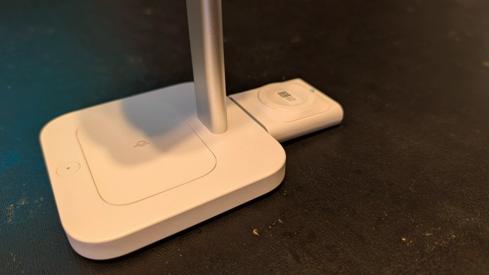 A close-up view of the ESR CryoBoost 3-in-1 Magnetic Charging Station, featuring a horizontal charging pad for a phone and a vertical stand for Apple Watch and AirPods, all in a sleek, minimalistic design.