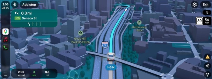 A digital navigation map displaying a 3D view of a city with highways, showing the I-5 N route and directions to Seneca Street, along with nearby parks.