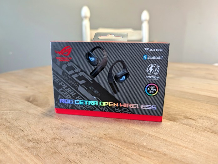 Box packaging of ASUS ROG Cetra Open Wireless earbuds displaying Bluetooth compatibility and features including Speednova and ASUS Aura RGB.