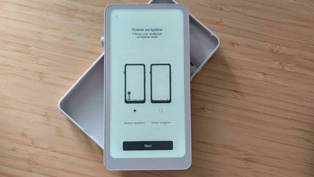A mobile device setup screen displaying options for system navigation, including 'Gesture navigation' and 'Virtual navigation'.